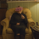A person wearing year 2000 celebratory glasses.